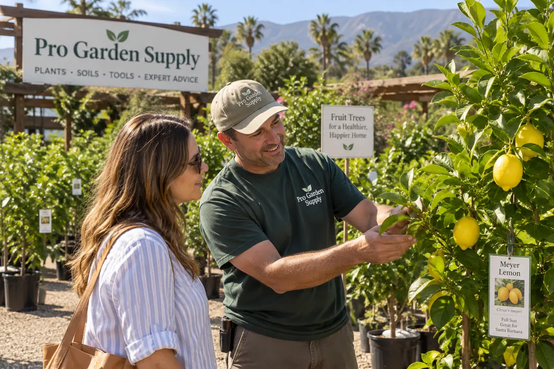 A nursery team member helping a customer choose a fruit tree